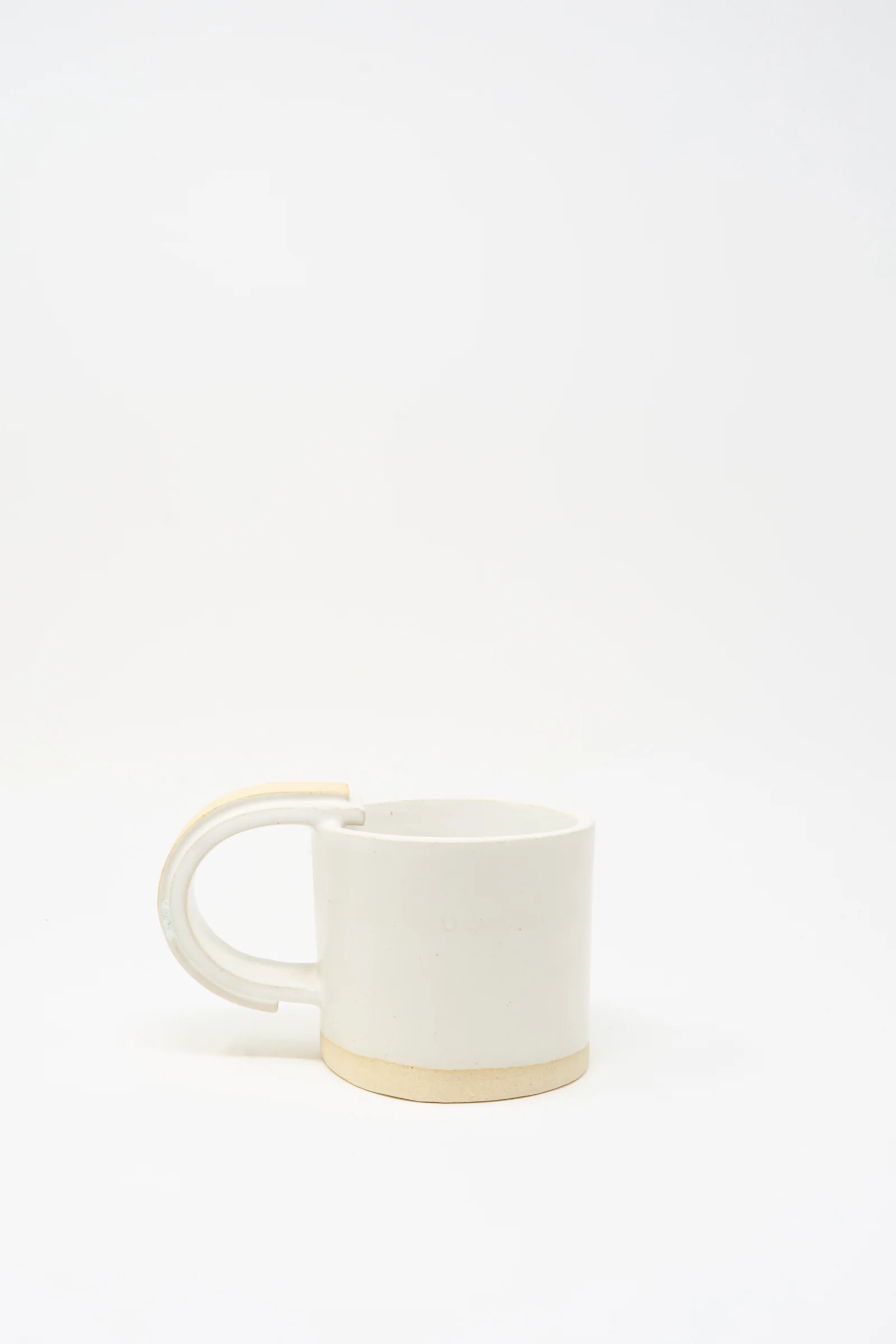 Layered Mug in White on Sand - Image 4